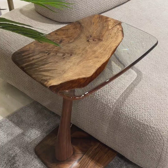 a detailed video of a walnut end table in a luxury place.