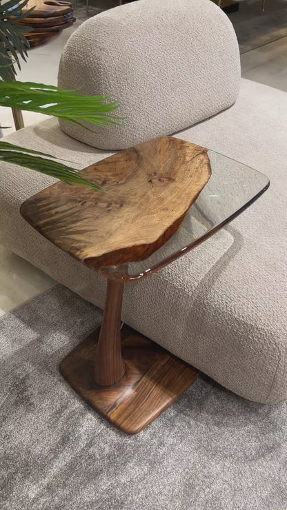 a detailed video of a walnut end table in a luxury place.