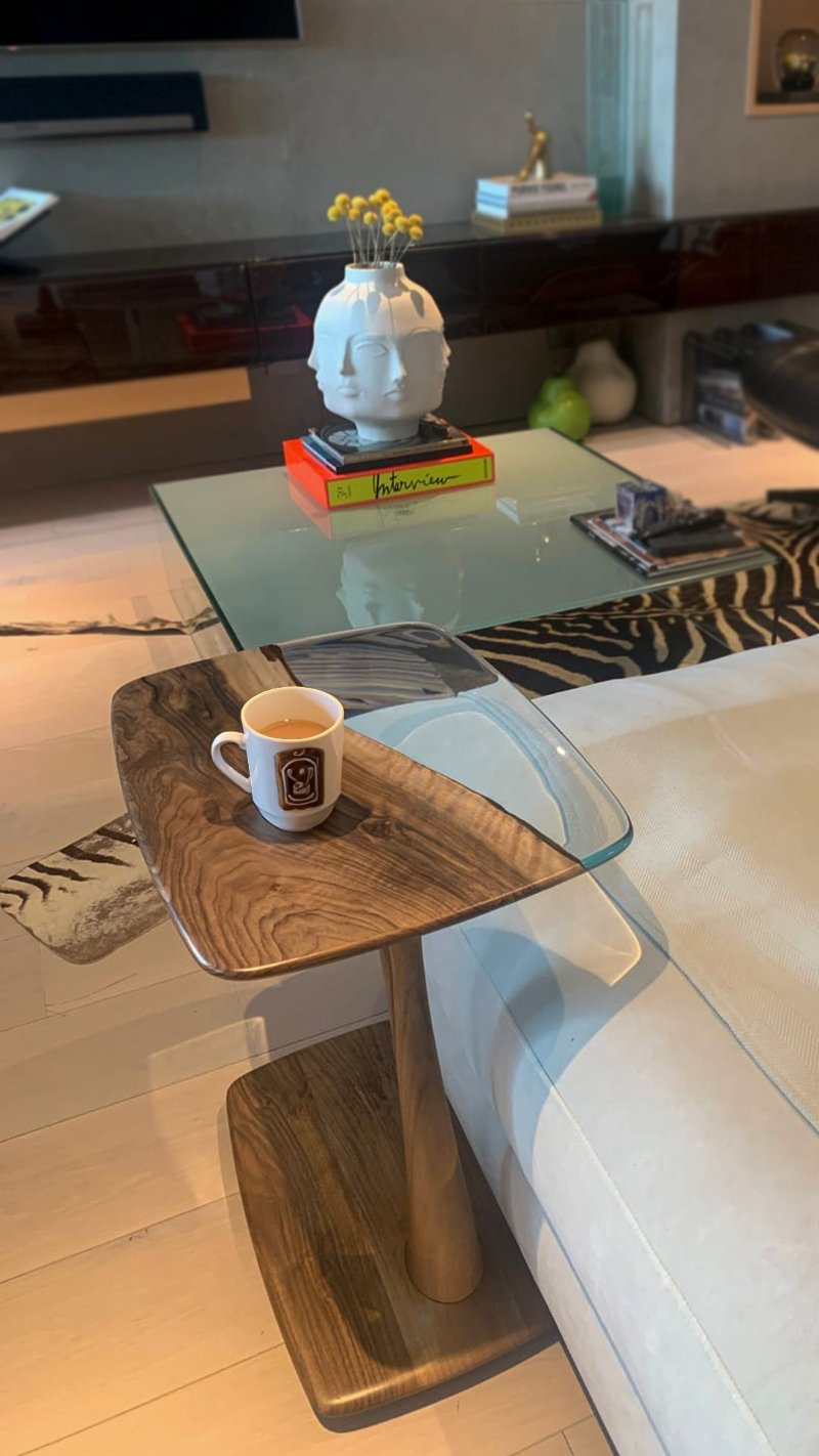 a walnut & epoxy resin end table in a premium living room.