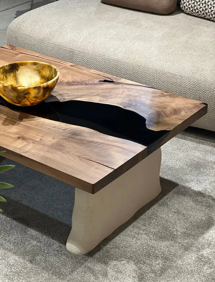 walnut coffee table with cement looking legs